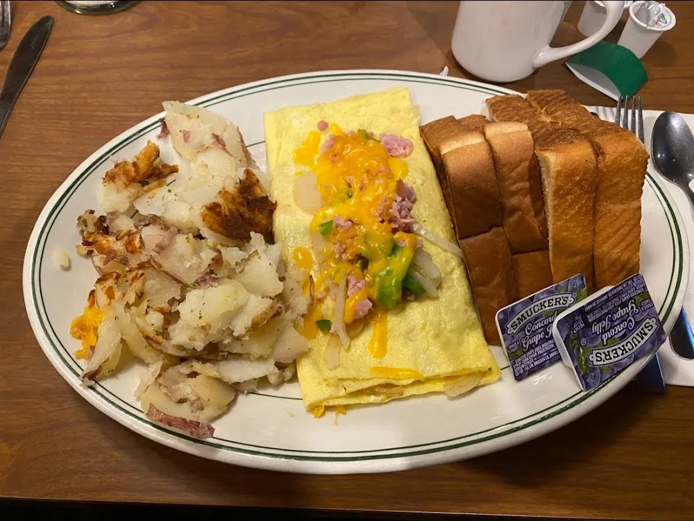 With 2 Eggs Toast & Home Fries Or